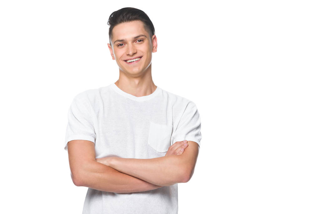 stock-photo-handsome-smiling-man-standing-crossed-arms-white-shirt-isolated-white